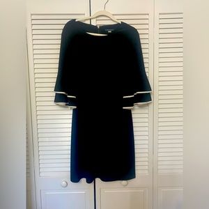 Tommy Hilfiger black dress with white pipping on the sleeves! Size 10